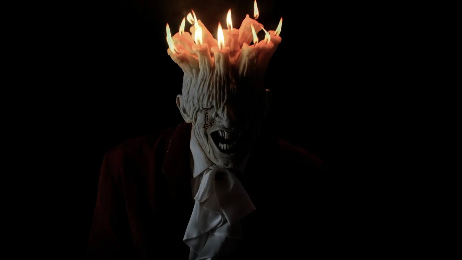 Official Tenebris Somnia artwork of a pale figure crowned with burning candles